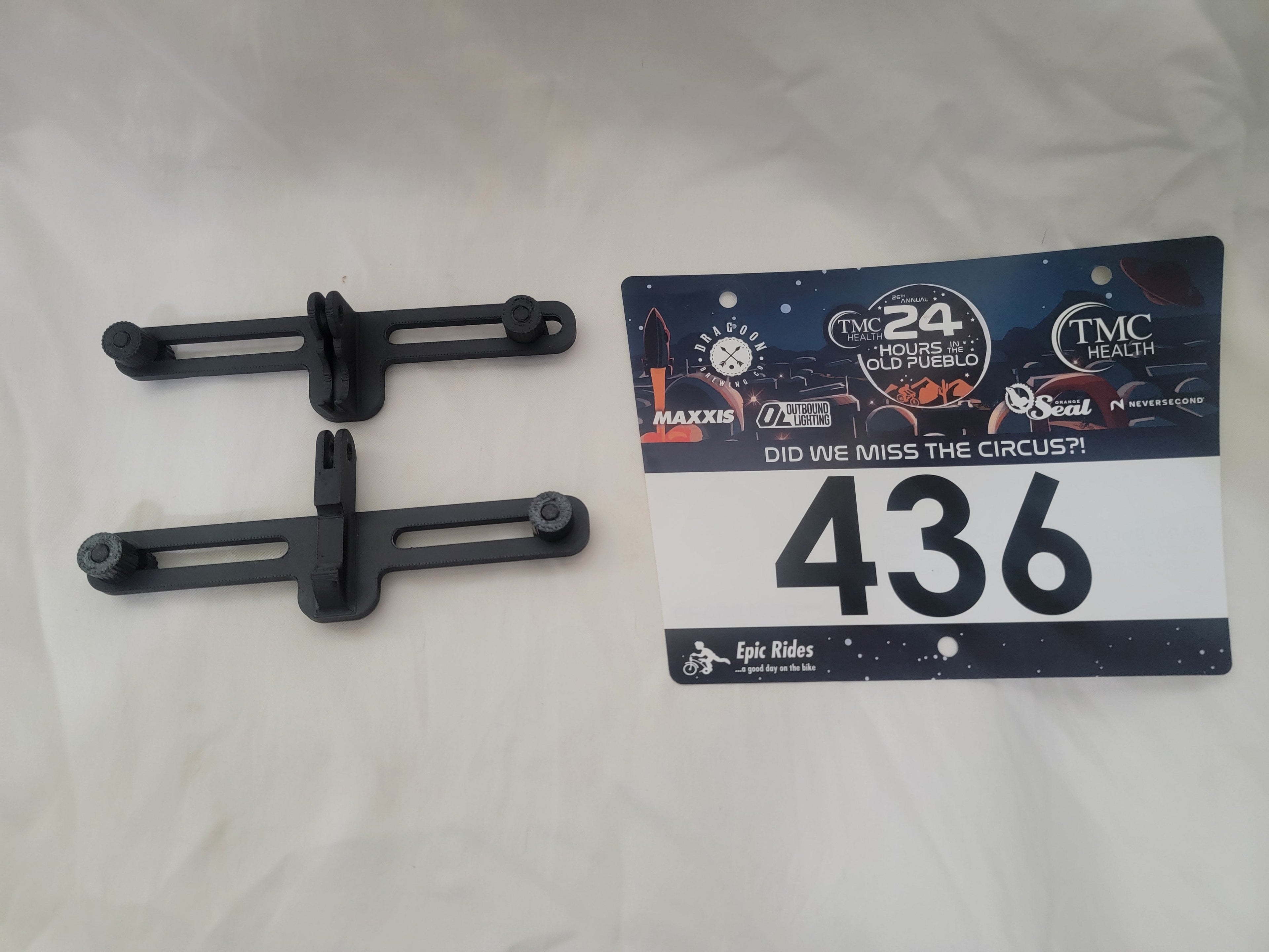 Number plate holder with bolts